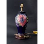 Moorcroft, a baluster shaped table lamp on blue ground, height 29cm.