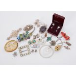 A mixed lot to include some costume jewellery including brooches, pendants, earrings, some silver