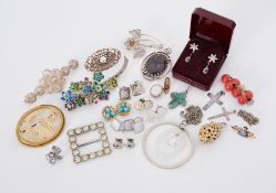 A mixed lot to include some costume jewellery including brooches, pendants, earrings, some silver