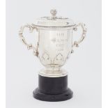 A silver lidded trophy engraved 'The Holman Cup 1976', London, 1934-35, maker RC, approx. 13oz (