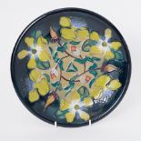 Moorcroft green flower plate, diameter 26cm (crazing).