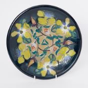 Moorcroft green flower plate, diameter 26cm (crazing).