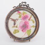 An early 20th century silver circular photo frame with ribbon detail, diameter 16cm.