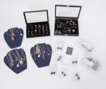 A large quantity of costume & some silver jewellery to include pendants, rings, earrings, etc,