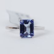 A 10k white gold ring set with a 2.15 carat rectangular cut AA Tanzanite, 2.46gm (with label),