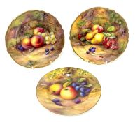 Royal Worcester, three plates decorated with fruit, two signed by N H Price
