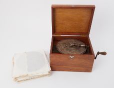 A Polyphon music box together with eighteen records (very well used).