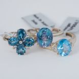 Three silver rings set with topaz to include Swiss blue topaz, London blue topaz & Mystic Neptune