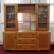 A large light elm Ercol wall unit with sections, height 161cm, width 155cm.