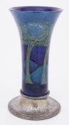 A William Moorcroft Moonlit Blue vase on a Tudric base, height 30cm (restoration to the rim).