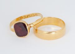 A 22ct yellow gold wedding band, 3.95gm, size J 1/2 to K and a 22ct yellow gold antique ring set