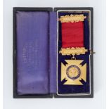 A 9ct gold medal inscribed to the reverse 'The order of Merit & Honour of Knighthood was conferred