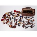 Pipes, a mixed collection of Antique and novelty pipes, leather pipes, also Gladstone bag etc.