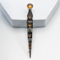 A Scottish Dirk brooch (pin missing).