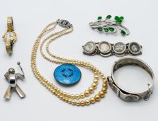 An interesting mixed lot to include an antique silver engraved belt buckle bangle, 28.13gm, a silver