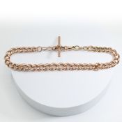 A 9ct rose gold graduated link 'guard chain' style bracelet with T-bar & swivel clasp, length