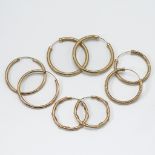 Four pairs of 9ct yellow gold hoop earrings of various sizes and designs, total weight 5.69gm, (some