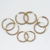 Four pairs of 9ct yellow gold hoop earrings of various sizes and designs, total weight 5.69gm, (some