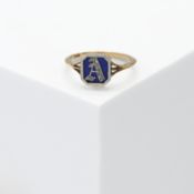 An antique 18ct yellow gold signet style ring with blue enamel and the letter 'A' set with small old