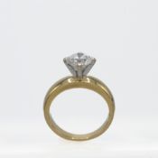 An 18ct yellow & white gold ring set with approx. 1.67 carats of round brilliant cut diamond,
