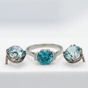 An 18ct white gold and blue zircon ring, size M together with a pair of blue zircon earrings (