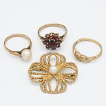 Three 9ct gold rings and a 9ct gold pearl brooch, approx 9g (4).