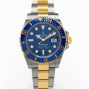 Rolex, a 2023 Oyster Perpetual Submariner 'bluesy' 41mm in showroom condition, model 126613LB,