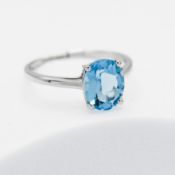 A 9ct white gold ring set with 3.48 carats of oval cut Swiss blue topaz, 2.60gm (weighed with tag
