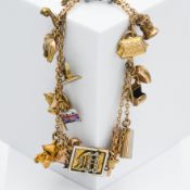 An antique 9ct yellow gold double chain charm bracelet set to a central square shaped panel with the