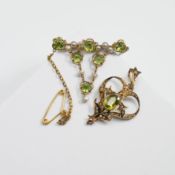 A 9ct yellow gold Art Nouveau style pendant set with an oval cut peridot and seed pearls, 2.36gm,