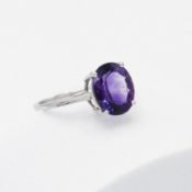 A 9ct white gold ring set with 3.25 carats of oval Moroccan Amethyst, 2.81gm (weighed with tag),