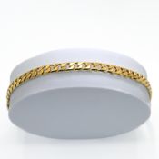 An 18ct yellow gold curb link bracelet, length 22cm, 26.49gm.