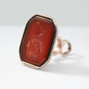 A yellow gold fob with a carnelian seal, (not hallmarked or tested), 6.60gm.