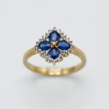 A 9ct yellow gold diamond and sapphire 'Flower' style ring, size M.