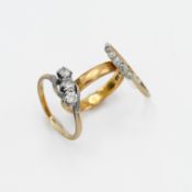 A 22ct yellow gold wedding band, 4.15gm, size O, an 18ct yellow gold five stone diamond ring, 1.