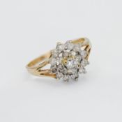 A 9ct yellow gold and diamond cluster ring, size M (hallmark rubbed).