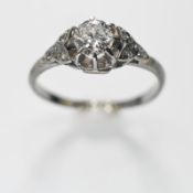An 18ct white gold & platinum Edwardian ring set with a central old round cut diamond approx. 0.60
