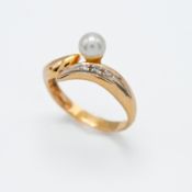 An 18ct rose gold diamond and pearl ring, set with three diamonds, size O. Together with a photo