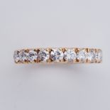 An 18ct yellow half eternity style ring set with seven round brilliant cut diamonds
