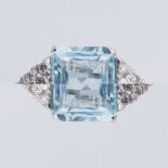 An 18ct white gold ring set with a central emerald cut aquamarine, approx. 4.70 carats