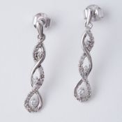 A pair of 9ct white gold twist design drop earrings set with round brilliant cut diamonds