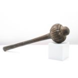 A antique Fijian Ula (Throwing Club), of dense hard wood the domed head carved with a band of lobes,