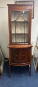 Edwardian mahogany half glazed display cabinet