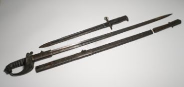 A bayonet marked US 9709/2, SA 1918, length 51cm together with a sword, length approx. 85cm, to