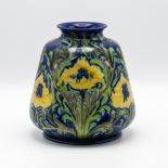 A William Moorcroft Florian ware vase decorated with yellow cornflowers, 21cm height, circa 1913.