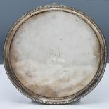 George III silver small salver, double beaded edge, London circa 1824, makers mark IH possibly