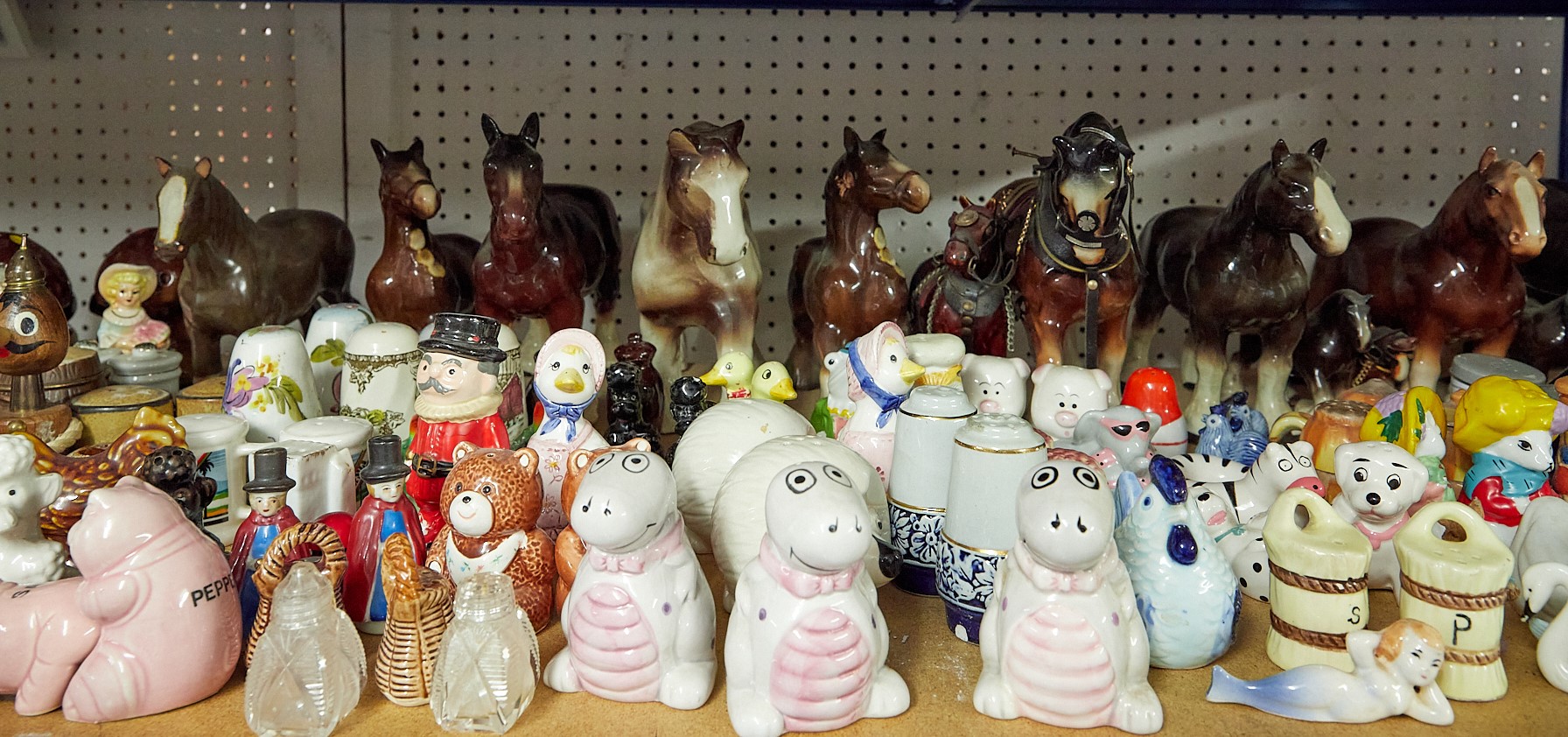 A huge collection of China wares mainly novelty salt and pepper pots. - Image 3 of 5