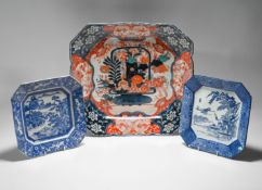A large Imari Charger, Meiji period, of lobed square shape and decorated in the centre with a basket