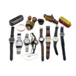 A mixed lot of items including Seiko watch, Lorus watch, two small tin plate buses, wooden carved