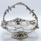 A Victorian silver pierced and decorated fruit basket with swing handle, Exeter, circa 1852, RJ &